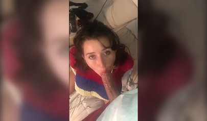 Busty amateur brunette teen giving a sloppy blowjob in bed