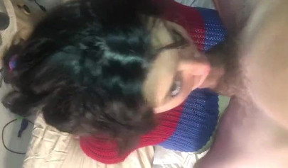 Busty amateur brunette teen giving a sloppy blowjob in bed