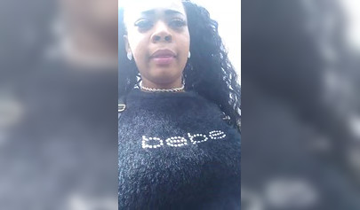 Ebony cutie with curly hair masturbating until her pussy squirts