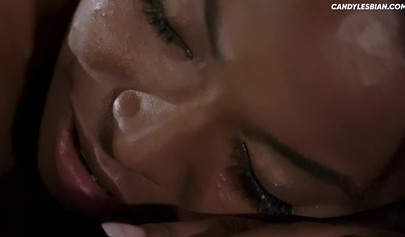 Lesbian beauties rub their ebony pussies until they cum