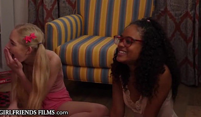 Lesbian cheerleaders Morgan Rain and Scarlit Scandal wildly scissoring