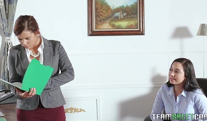 Bossy Karlee Grey fucking a female co-worker with a strapon