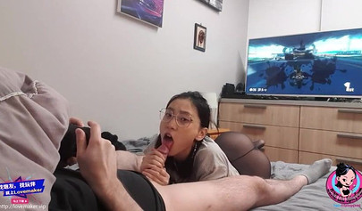 Chinese teen June Liu blows her boyfriend's cock