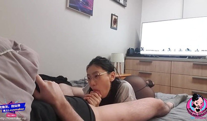 Chinese teen June Liu blows her boyfriend's cock