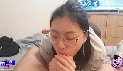 Chinese teen June Liu blows her boyfriend's cock