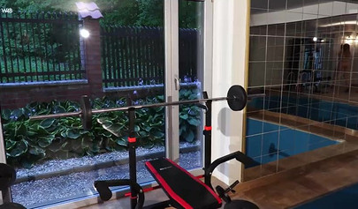 Petite cutie with big natural tits working out naked