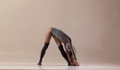 Stunning ballerina teen with an amazing body stripping and stretching