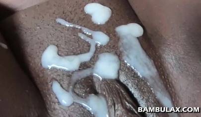 Amateur ebony teen gets her chocolate pussy covered in jizz