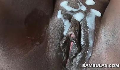 Amateur ebony teen gets her chocolate pussy covered in jizz