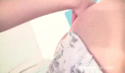 Breathtaking teen strips and plays with her vagina in the bathroom