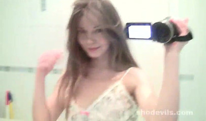 Breathtaking teen strips and plays with her vagina in the bathroom