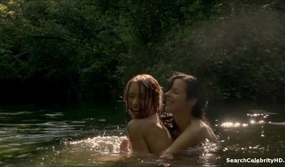 Amateur teens with big tits strip in nature and get wet