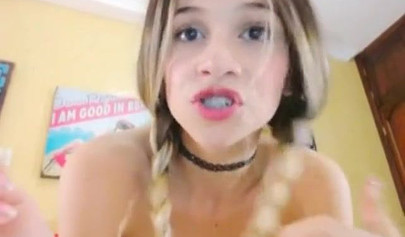 Young blonde stripping on webcam and spreading her pussy