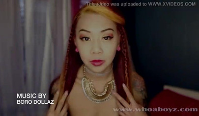 Inked Asian teen Kimberly Chi dominates a big black dick