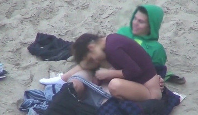 Hot brunette teen caught riding a dick on the sandy beach