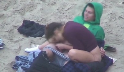 Hot brunette teen caught riding a dick on the sandy beach