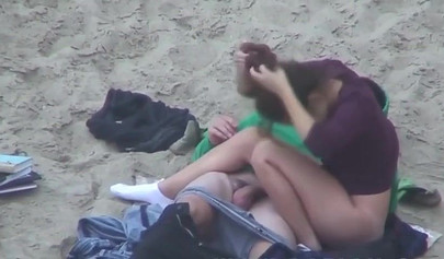 Hot brunette teen caught riding a dick on the sandy beach