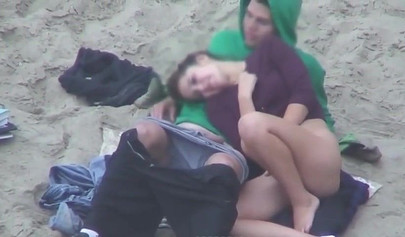 Hot brunette teen caught riding a dick on the sandy beach