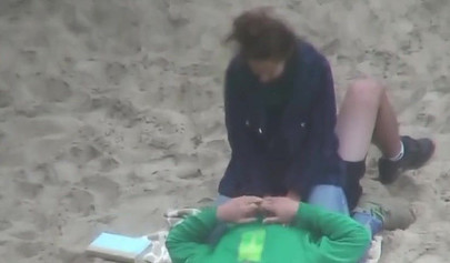 Hot brunette teen caught riding a dick on the sandy beach