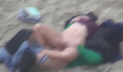 Hot brunette teen caught riding a dick on the sandy beach