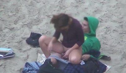 Hot brunette teen caught riding a dick on the sandy beach