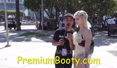 PornHub reporter gives a young babe cash to show her tits