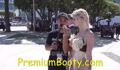 PornHub reporter gives a young babe cash to show her tits