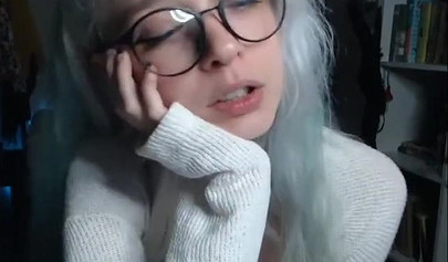 Teenage nerd shows her tiny tits and sucks a plastic dick