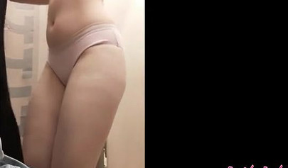 Hot college babe Candy Camille touches herself while changing in the dressing room