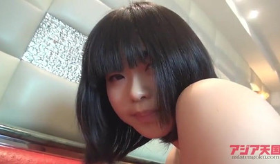 Adorable Japanese teen showcases and touches her bald vagina