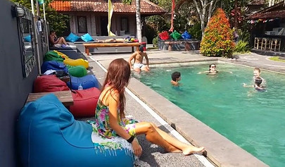 Pantyless teen in sexy summer dress flashes her trimmed pussy in public