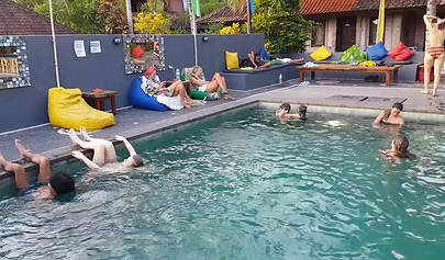 Pantyless teen in sexy summer dress flashes her trimmed pussy in public