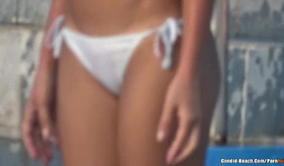 Hot teens with big tits posing topless in public