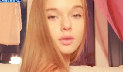 Attractive teen model in lingerie spreading her fuzzy pussy on webcam