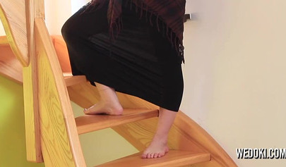 Sexy Emo teen strips on the stairs and shows her perky medium tits