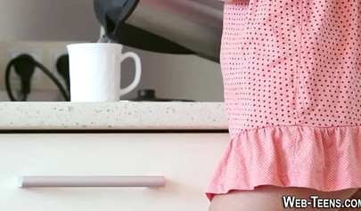 Horny blonde teen Eve Luv strips naked and fingers her cock-hungry snatch